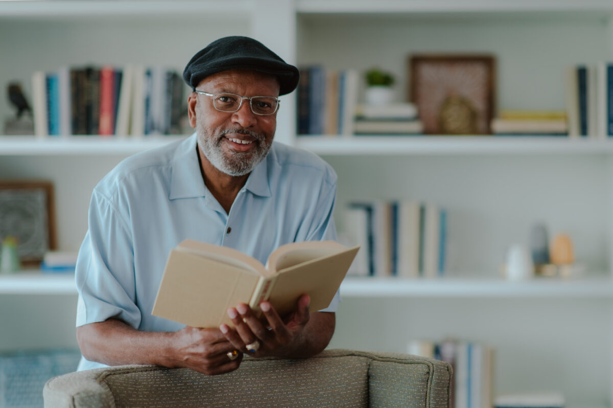 Senior male reading book