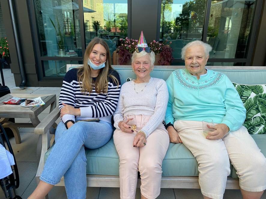 3 ladies sitting on birthday